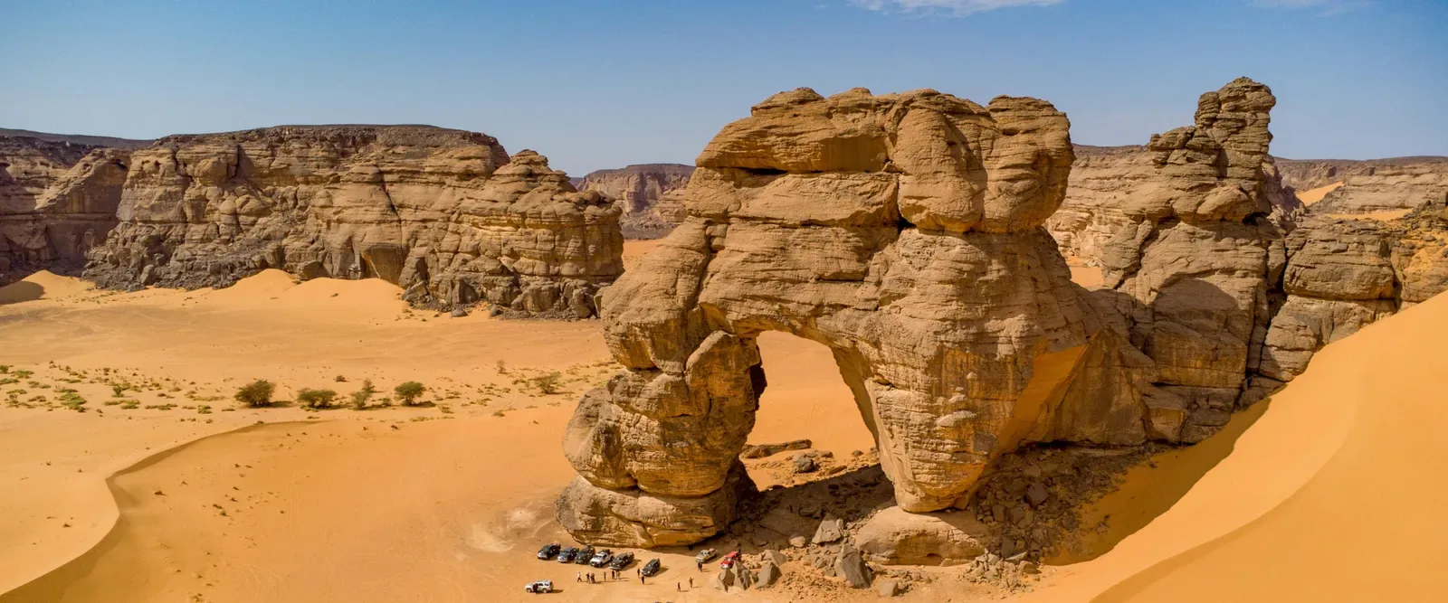 Rock formations and dunes in Tadrart Rouge, Algeria
