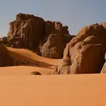 Towering dunes and rock formations in Sahara