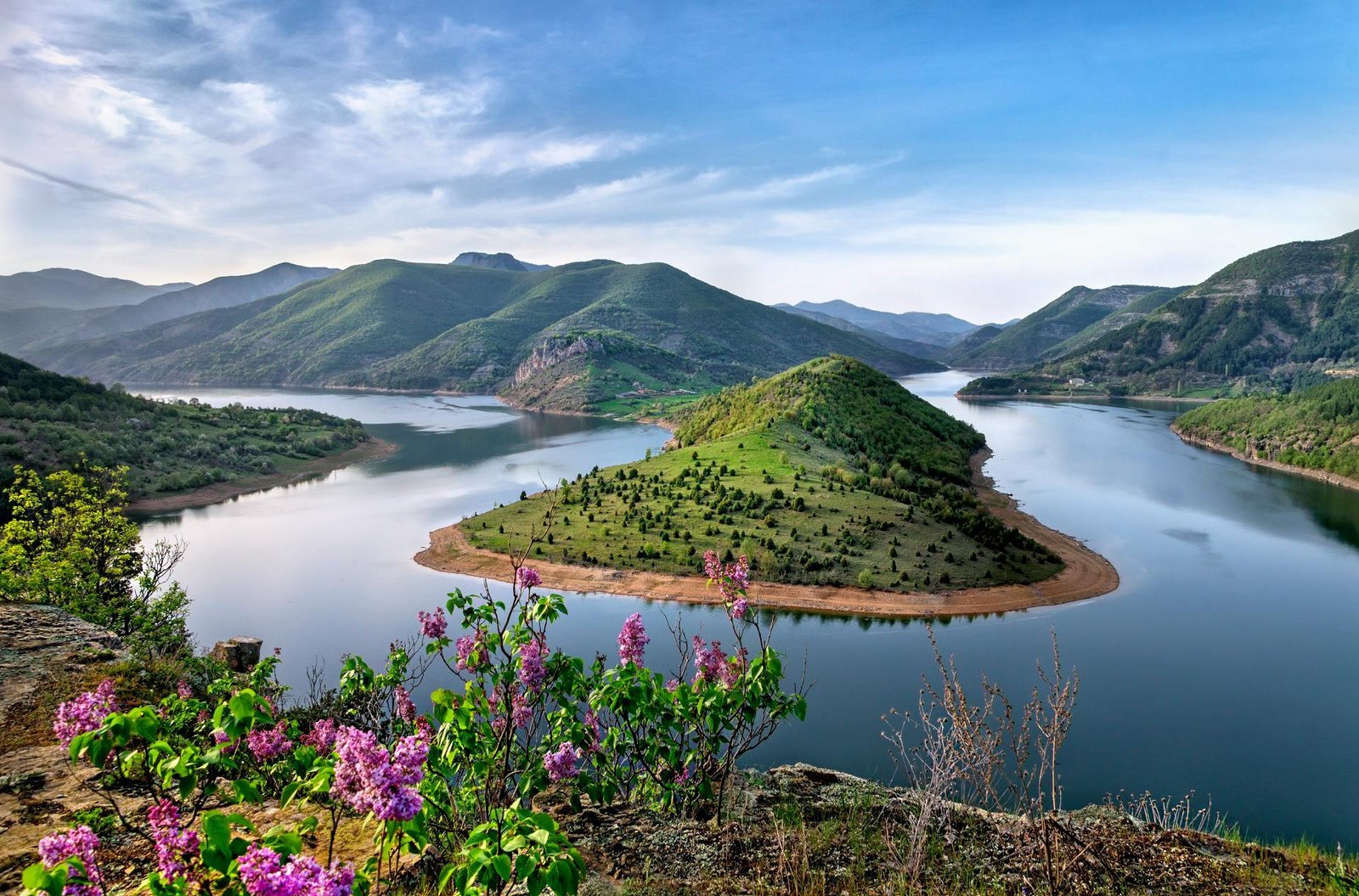 Bulgarian mountain lake and green hills